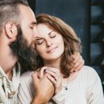 heterosexual-couples-young-beautiful-man-and-woman-on-bed-in-bedroom-picture-id855269612