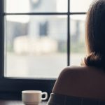 back-view-of-lonely-aucasian-young-woman-wrapped-in-a-plaid-enjoying-picture-id1277090283 (1)