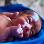 newborn-with-its-umbilical-cord-picture-id1330820625