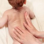 body-massage-for-the-baby-warmup-for-the-newborn-the-development-of-picture-id1240561931
