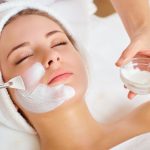 woman-in-mask-on-face-in-spa-beauty-salon-picture-id921797424