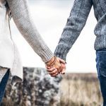 pretty-young-couple-in-love-outdoor-picture-id1083336694