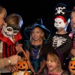 halloween-party-with-children-trick-or-treating-picture-id122702843