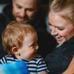young-family-of-father-mother-and-infant-son-reading-bedtime-stories-picture-id1330792244