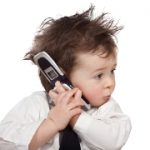 beautiful business kid use mobile phone