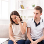 Young couple arguing during therapy session