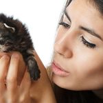 Woman holding a kitten