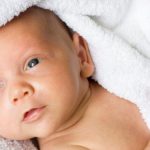 cute little newborn baby after bath