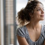 Portrait of a thoughtful woman at home during quarantine