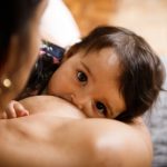 mother-breastfeeding-her-baby-picture-id1266799069