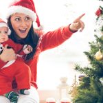 Mother and her baby boy enjoying Christmas