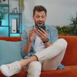 happy-handsome-man-at-home-couch-use-smartphone-typing-browsing-say-wow-yes-found-out-great.jpg_s=1024×1024&w=is&k=20&c=ZwAN2RGTanpRKmp1XvpfuqWH5NkLr2D2ZangqjQMaXM=