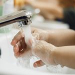 toddlers-wash-their-hands-in-a-washstand-in-kindergarten-concept-of-picture-id1198446303
