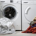 one coloured one white pile of washing