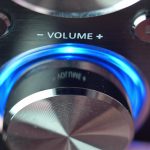 Adjusting Volume on Stereo Set Close-Up