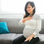 Pregnant wife having acid reflux because of her pregnancy