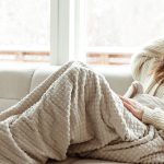 Woman with high fever at home