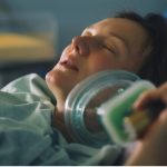 childbirth-woman-giving-birth-in-maternity-hospital-pregnant-woman-picture-id1307752417