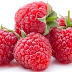 five-fresh-raspberries-in-white-background-picture-id472364310