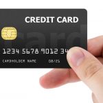 hand-holding-plastic-credit-card-picture-id885367710