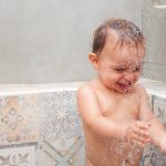 child-in-the-shower-picture-id1198714586