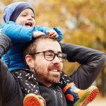 hes-making-daddys-shoulders-his-playground-picture-id1201605450