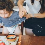 mother-make-the-mess-after-toddler-lunch-picture-id1006811558
