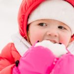 portrait-of-a-child-eating-snow-concept-of-a-holiday-emotions-of-picture-id1281642100