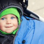 portrait-of-cute-caucasian-toddler-boy-in-black-hooded-warm-insulated-picture-id1276839951