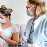 female-pediatrician-visiting-newborn-baby-at-home-during-new-normal-picture-id1266158308