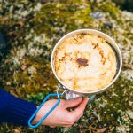cooking-pancakes-in-the-morning-while-on-a-hike-picture-id1201725189