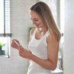 cheerful-woman-standing-and-holding-a-pregnancy-test.jpg_s=1024×1024&w=is&k=20&c=cHJnkgHGzehR1jLzQxz0noVUDOYthgwEauXeh6PgAw4=