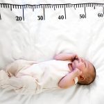 a-newborn-baby-in-white-sleeps-on-a-bed-on-which-a-measuring-ruler-for-growth-is-drawn.jpg_s=1024×1024&w=is&k=20&c=rLZQLZg_PxF05fID1Um8Q7v6ZFeUCCwyghQxj5FpEYc=