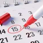 Concept of important day, reminder, organizing time and schedule – red marker pen marking day of the month on a calendar. 3d rendering