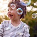 young-boy-having-fun-in-garden-chasing-and-bursting-bubbles.jpg_s=1024×1024&w=is&k=20&c=APx8iXXHG6HKy8MsEAJvZ2OcOtGOjO2XcrLVSdb-Ijc=