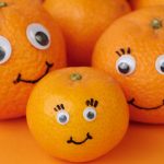 tangerine family on orange background