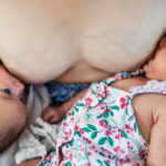 Mother Breastfeeding Twins Baby